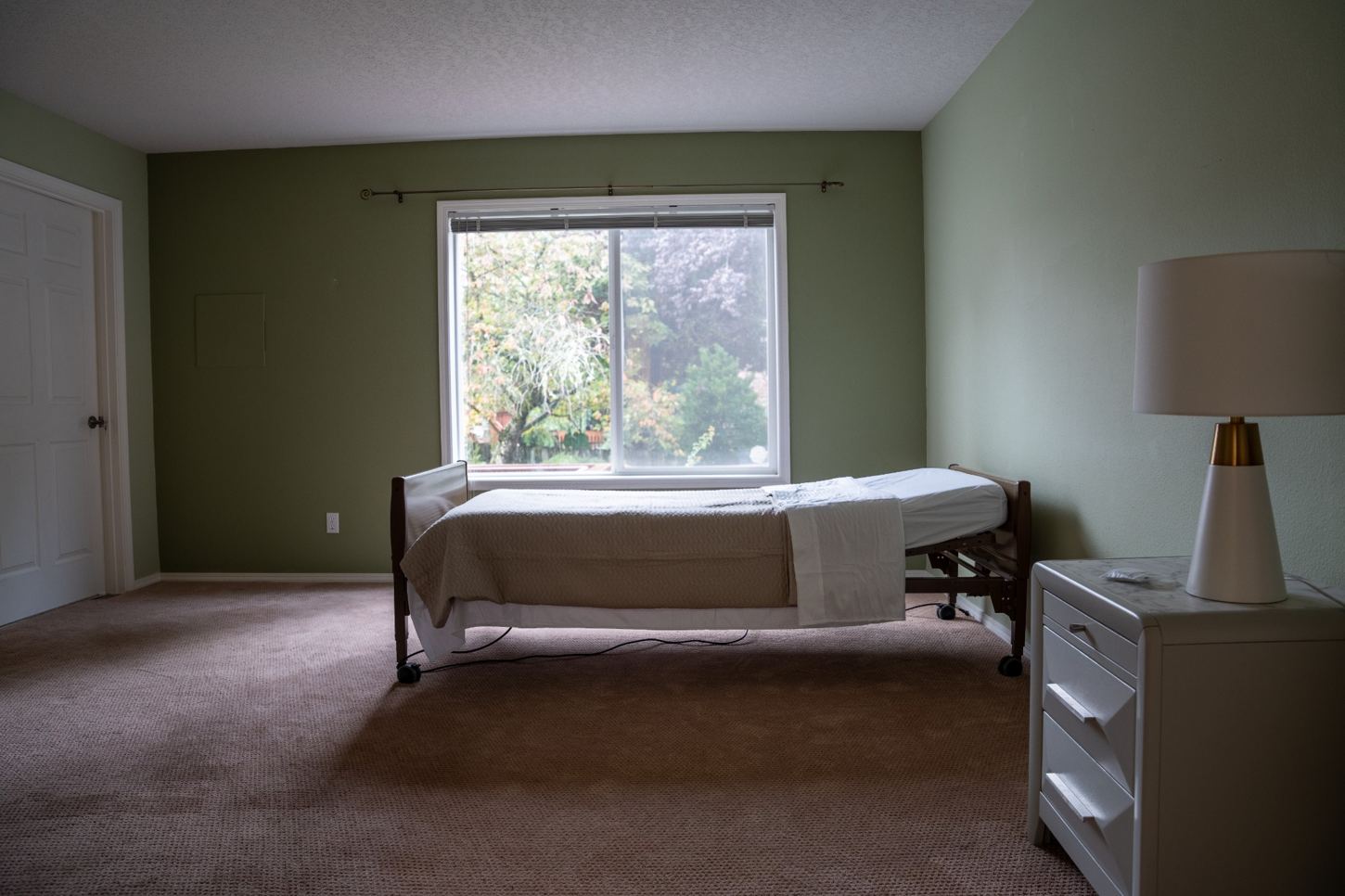 Spacious bedroom with window